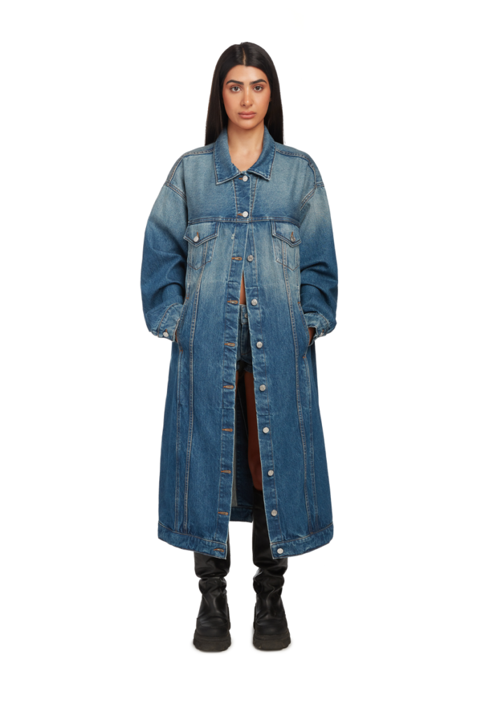 A female model with long denim coat and black boats