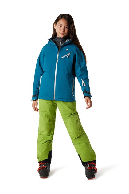 A girl with green and blue skiing attire and shoes