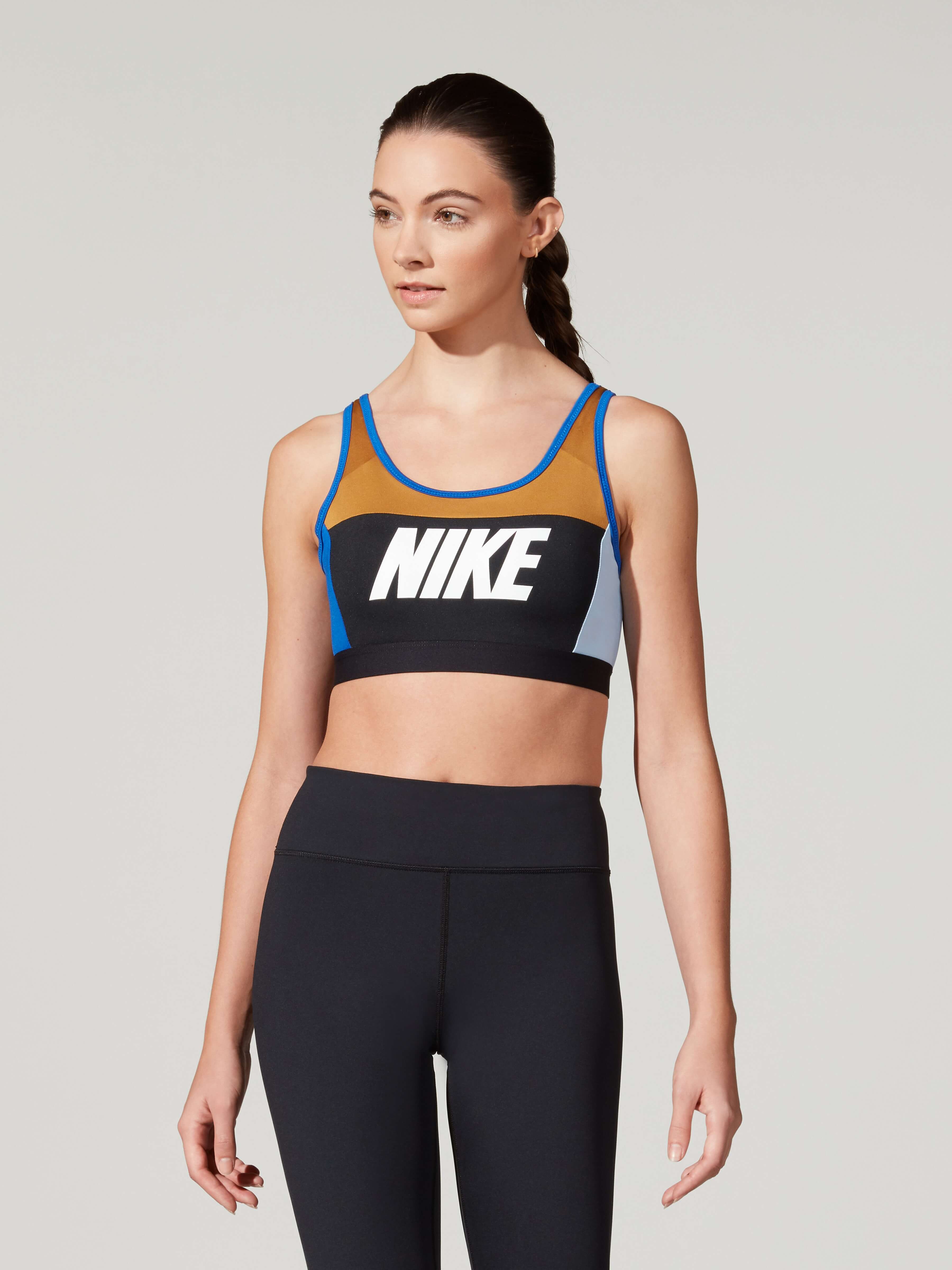 Female Nike black trouser and Nike tight top