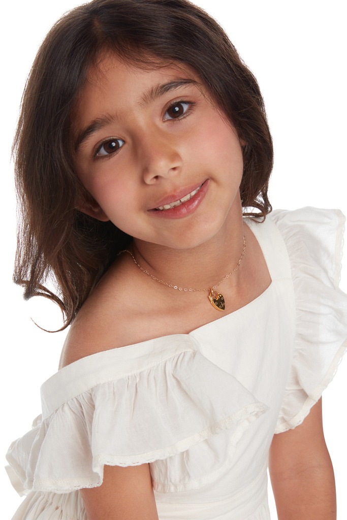 A small girl with white dress