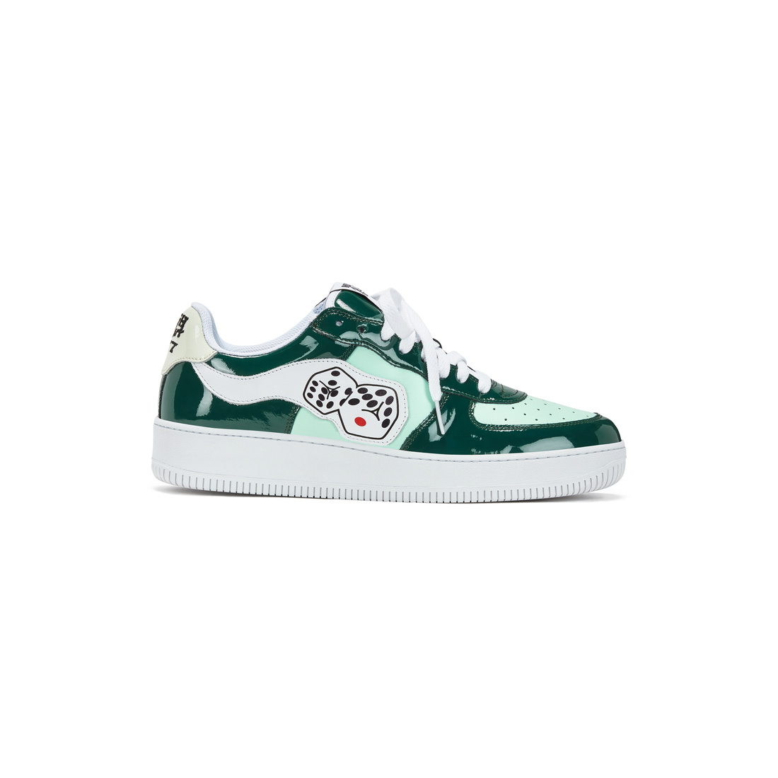 A green and white colored shoe